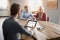 Viessmann contractor sits with a familly at a table